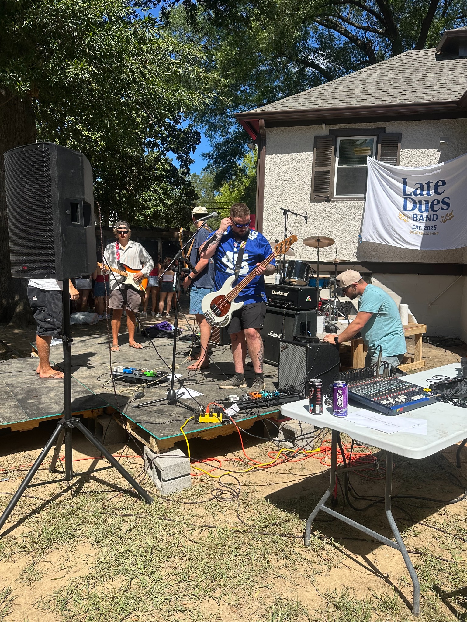 Late Dues performing an outdoor show